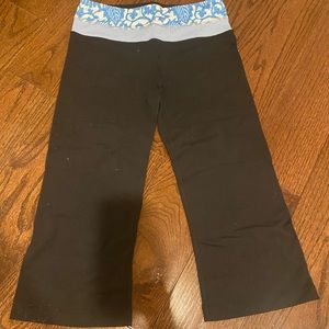 Lululemon size 4, black flared capris with blue band with pattern